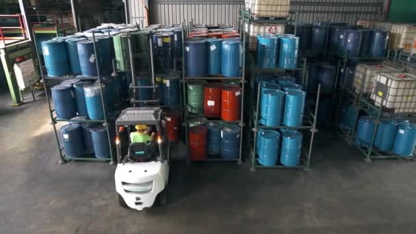 Fork Lift Taking Barrels Out Shelf Factory — Stock Video