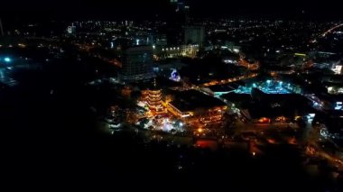 Night Aerial View of a Chinese Template next to the sea in the city of Kota Kinabalu - Malaysia