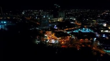 Night Aerial View of a Chinese Template next to the sea in the city of Kota Kinabalu - Malaysia