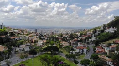 A Beautiful cityscape behind a park in Brazil - Aerial View