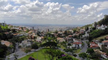 A Beautiful cityscape behind a park in Brazil - Aerial View