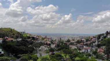 A Beautiful cityscape behind a park in Brazil - Aerial View