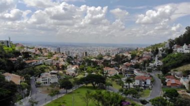 A Beautiful cityscape behind a park in Brazil - Aerial View