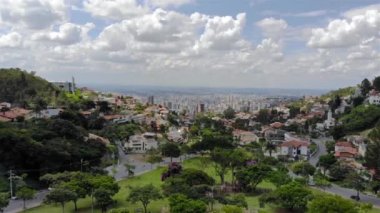 A Beautiful cityscape behind a park in Brazil - Aerial View