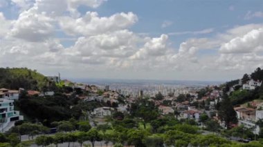 A Beautiful cityscape behind a park in Brazil - Aerial View