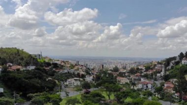 A Beautiful cityscape behind a park in Brazil - Aerial View