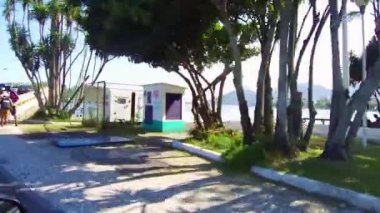 Side view and going over the bridge on a lake