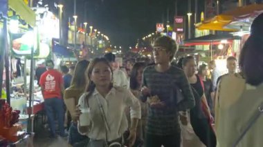 Front view of a busy night market in Kuala lumpur ,Malaysia