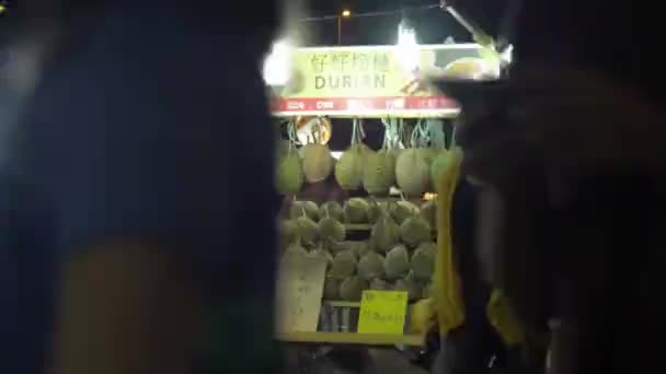 People Walking Front Durian Stall Night Market Kuala Lumpur — стоковое видео