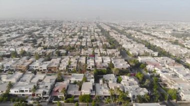 Top Aerial View of Karachi City with Colorful Buildings and Many Trees