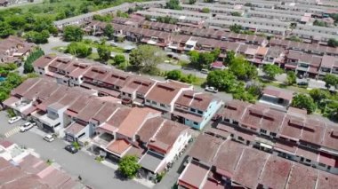 Top Aerial View From Residential Roofs With Roads and Many Trees in Melaka Malaysia - Tilt Up