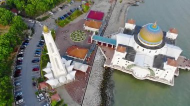 Top Aerial View From the Sky of a Beautiful White Mosque with Sea View