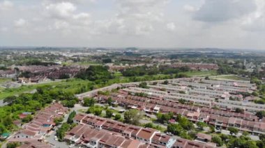 Top Aerial View of Residential Housing with Roads and Trees in Melaka Malaysia - Dolly Left To Right.