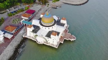 Top Aerial View From the Sky of a Beautiful White Mosque with Sea View