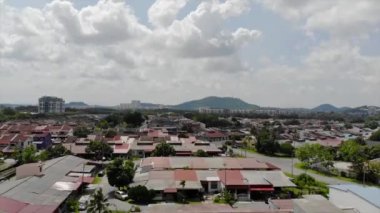 Top Aerial View of Residential Housing in Melaka Malaysia with Mountain View - Moving Up
