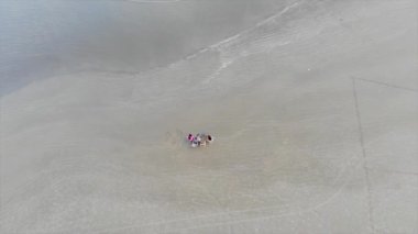 Top View Of Visitors Activities At Santos Beach