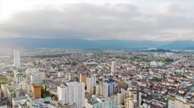 Top Are View Of Santos City With Beautiful Mountain And Sky Views - Backwards