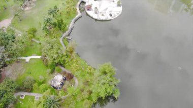  Top View Of Blue Buildings On The Edge Of A Lake