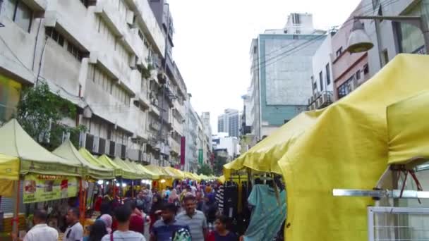マレーシア伝統市場の大きな建物 手が開催 — ストック動画