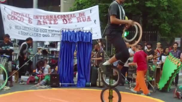 Man Ride Monobike Bring Ball Hula Hoop Circus Performance Slow — Stock Video