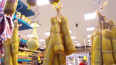  Huge cheese rolls hanging at the Municipal market in Belo Horizonte