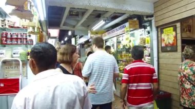 Old couple walking at the Municipal market in Belo Horizonte