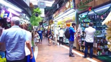 People walking in the indoor shopping area at the Municipal market in Belo Horizonte