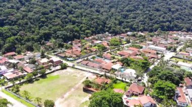 A beautiful small beach city with green mountains in Brazil