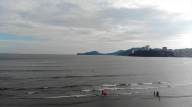 Aerial view of Brazilian beach with an Island on Sunday