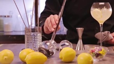 Adding Black Seeds with Garnish Tong