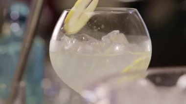 Yuzu Gin And Tonic Drink on background, close up