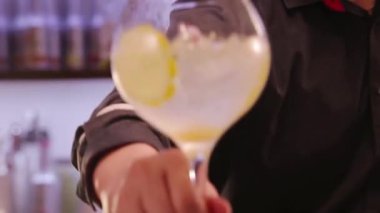 Yuzu Gin And Tonic Drink on background, close up