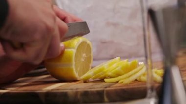 Cut Thin Lemon With a Knife