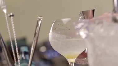 Pouring Liquid With Jigger Cup 