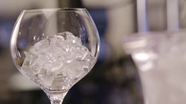 Putting Ice Glass Close — Stock video