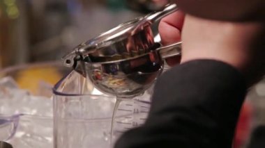 Squeeze Lemon Into Blender - Close Up