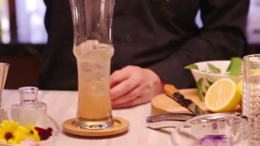 Add 1 Ice Flower To The Glass.