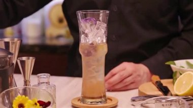 Adding Ice To The Mix - Close Up