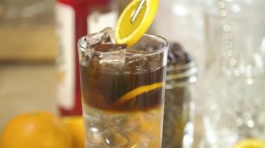 Add Slices of Orange and Herbal Leaves - Static.