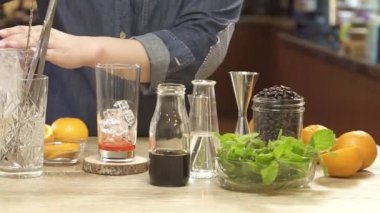 Putting Ice Into a Glass With Ice Scoop