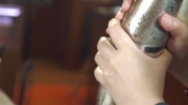 Opening the Shaker After Shaking - Close Up