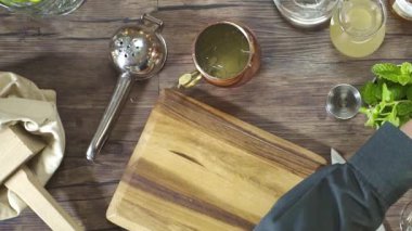 Adding Ice to the Small Jug