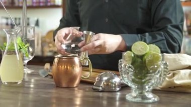 Adding Water With a Jigger - Slide Right to Left.