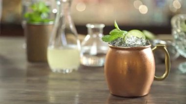 Beverage With Green Garnish - Slide Left To Right.