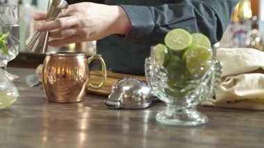 Pouring Yellow Liquid From Jigger Cup - Slide Right To Left