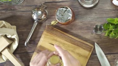 Pouring Yellow Liquid Over Ice.
