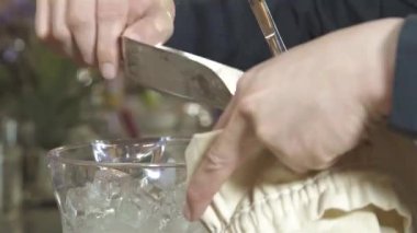 Put Some Ice Into a Cloth Bag - Close Up