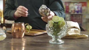 Squeeze Lime Into Small Jug 
