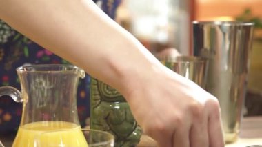 Pour White Liquid into an Iron Shaker.
