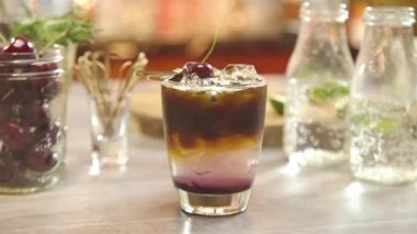 Coffee Drink with Cherry Garnish - Pull Focus